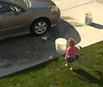 child playing with bucket